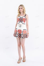 Cream High-Waisted Shorts with Red & Black Geometric Print & Buckle Belt