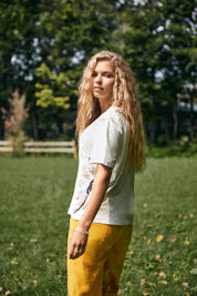 White Short-Sleeve T-Shirt with Side Crochet Flower Embellishments
