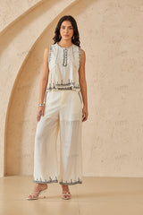 Cream Wide-Leg Pants with Black Embroidered Trim