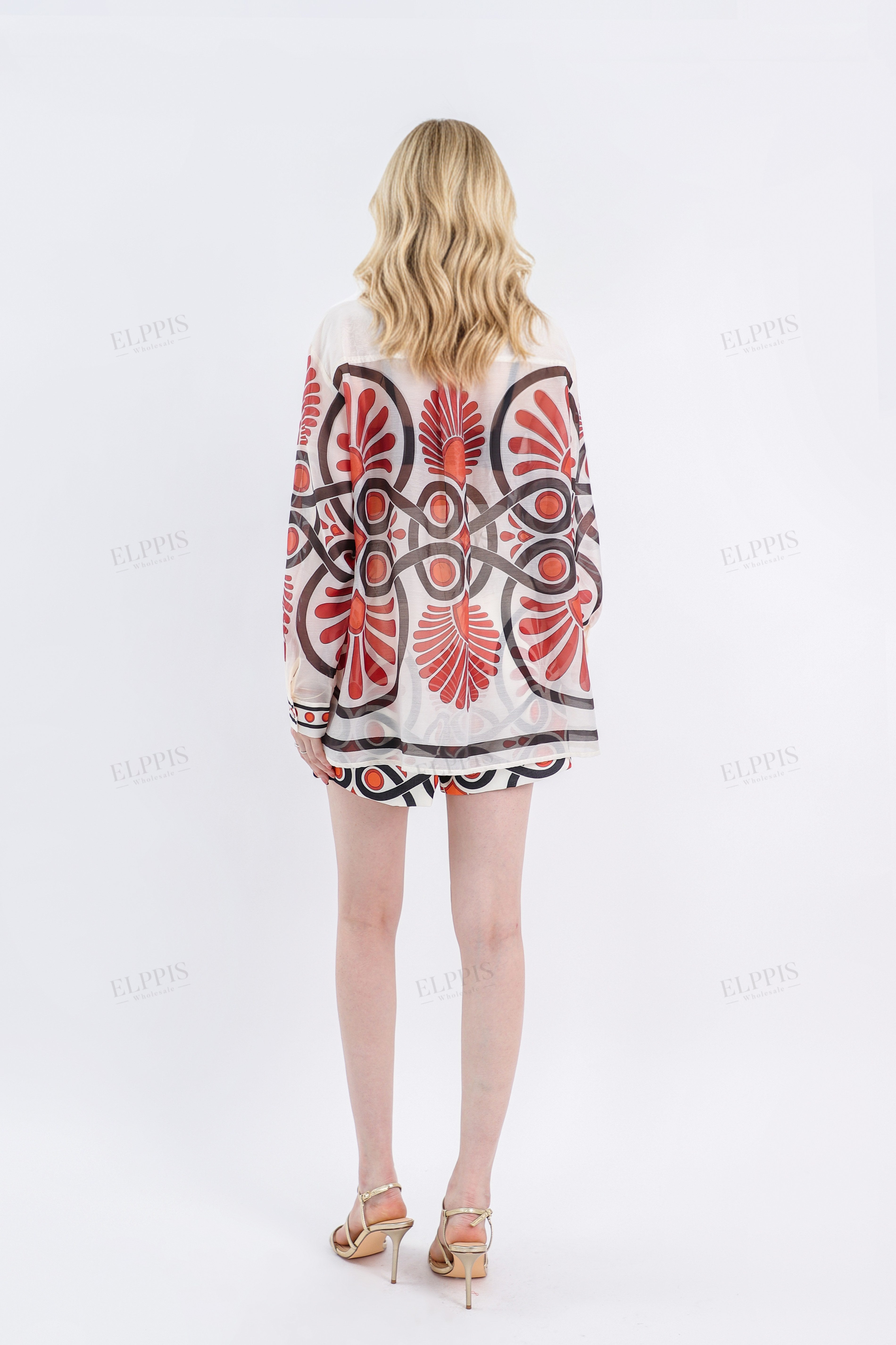 Cream High-Waisted Shorts with Red & Black Geometric Print & Buckle Belt