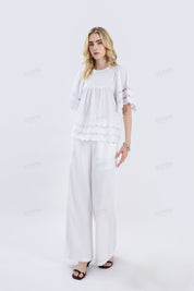 White Short-Sleeve Blouse with Cutwork Embroidery & Ruffled Hem