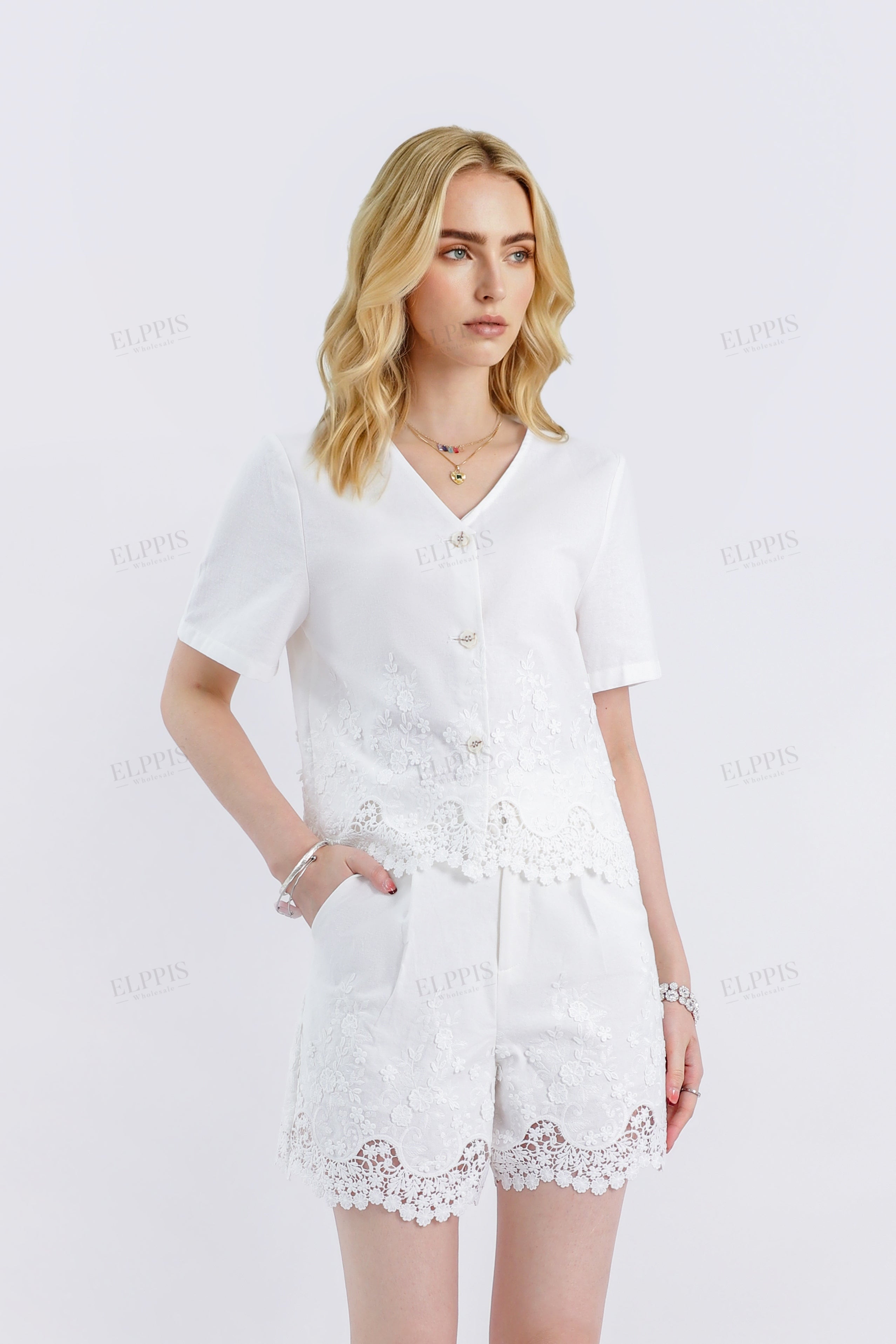 White Linen Shorts with Scalloped Lace Hem Detail