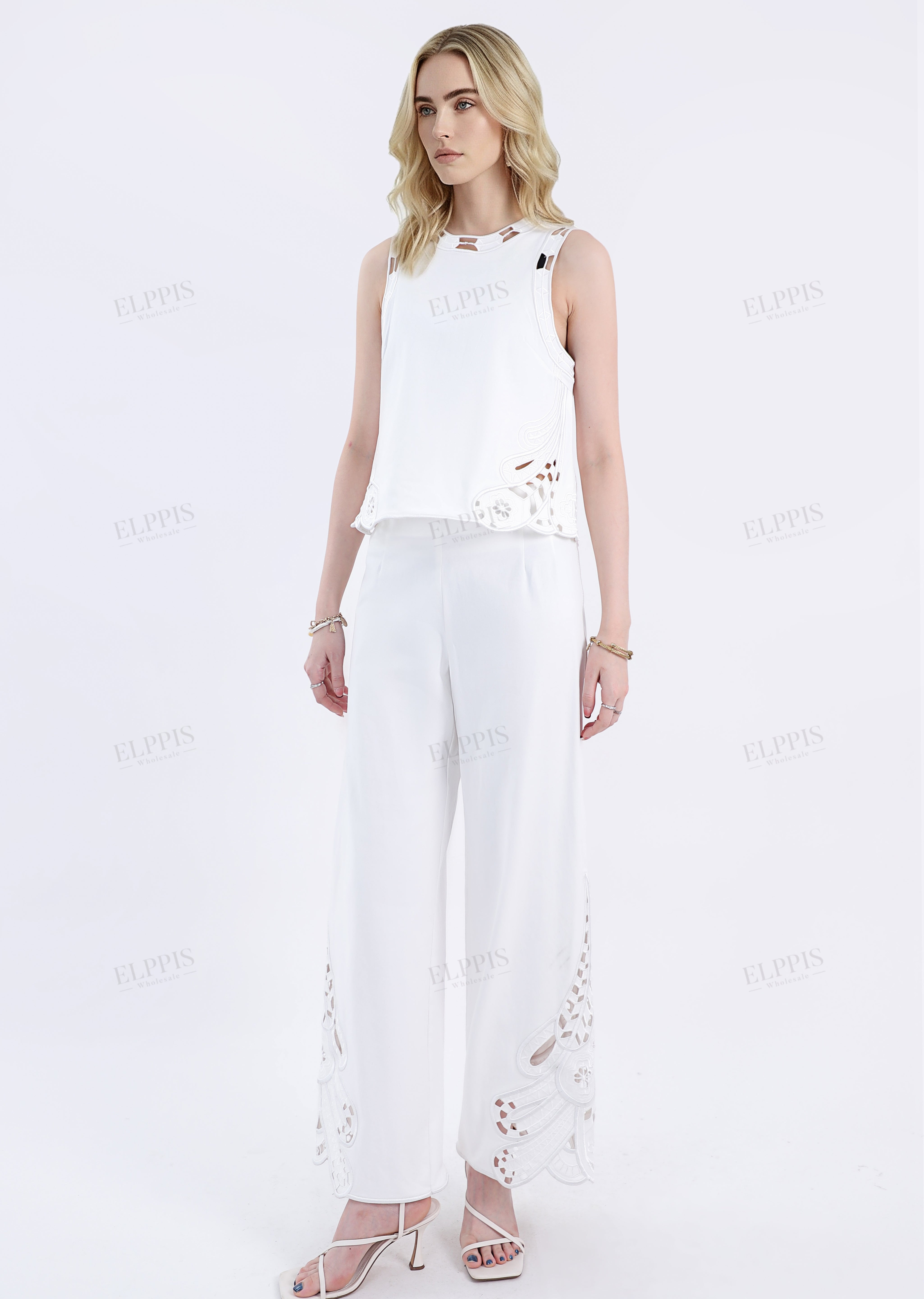 White Sleeveless Top with Cutout Embroidery Detail