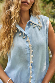 Light Blue Sleeveless Shirt with Pom-Pom Crochet Trim