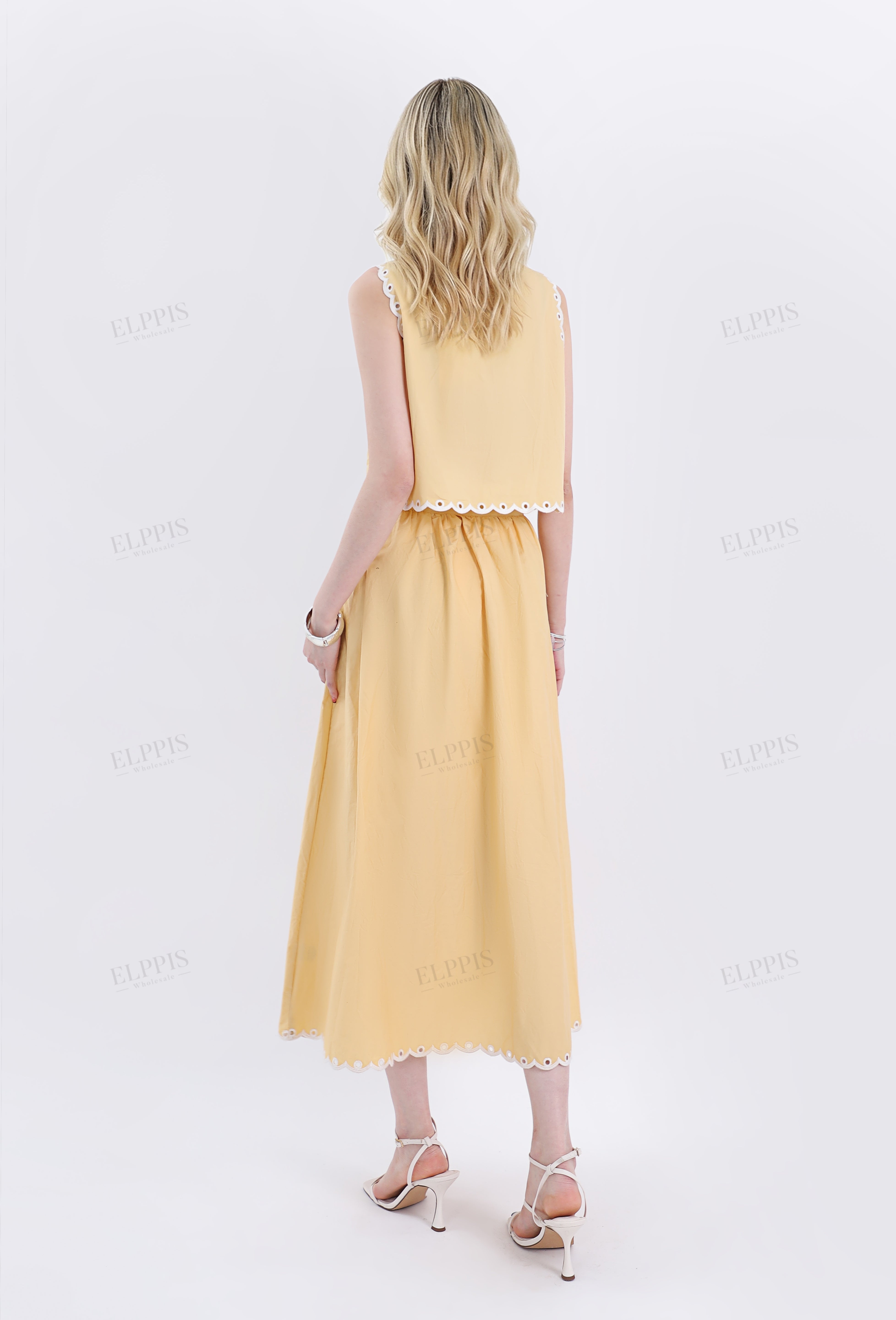 Yellow Sleeveless Cropped Top with Leaf Cutouts