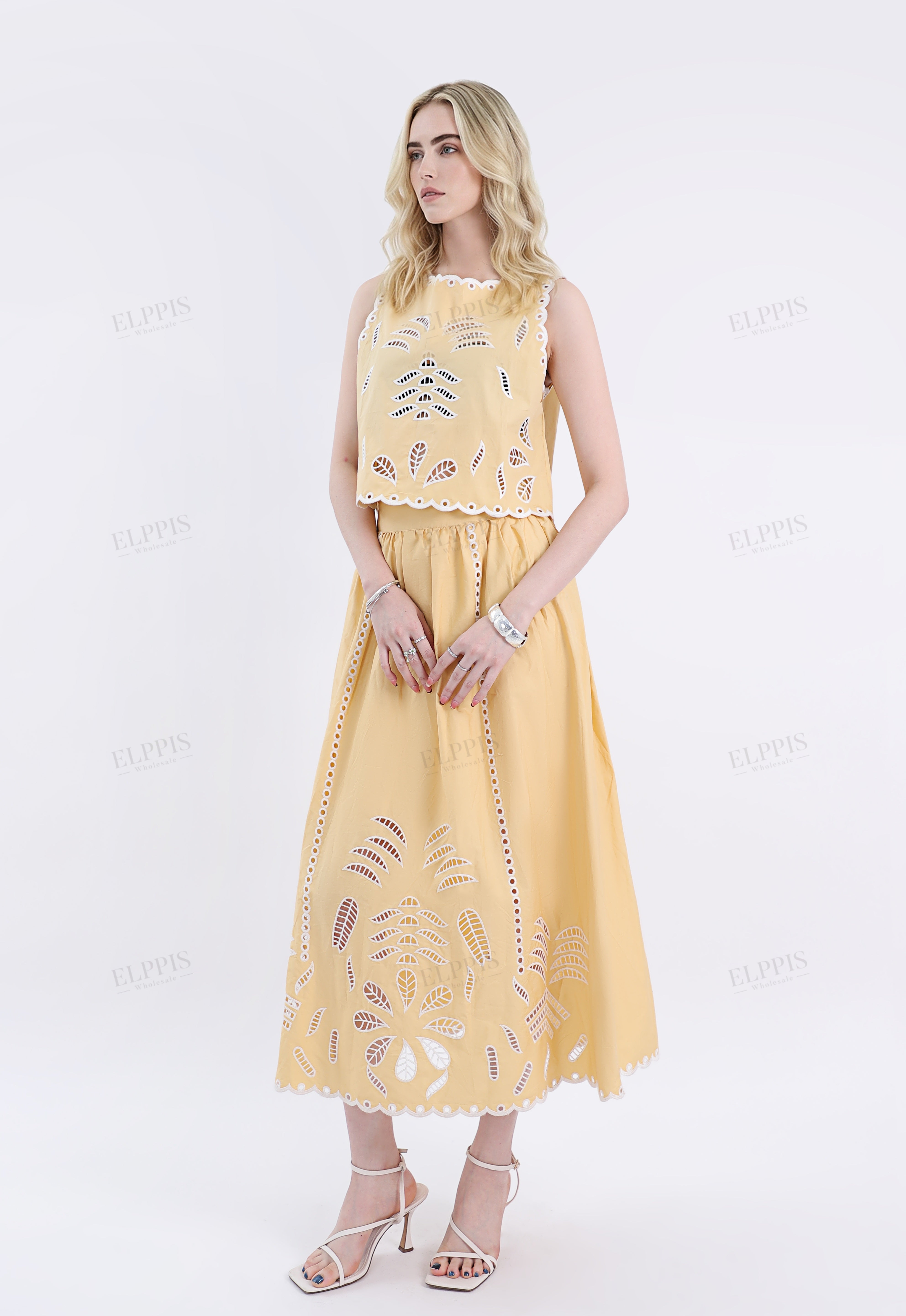 Yellow Sleeveless Cropped Top with Leaf Cutouts