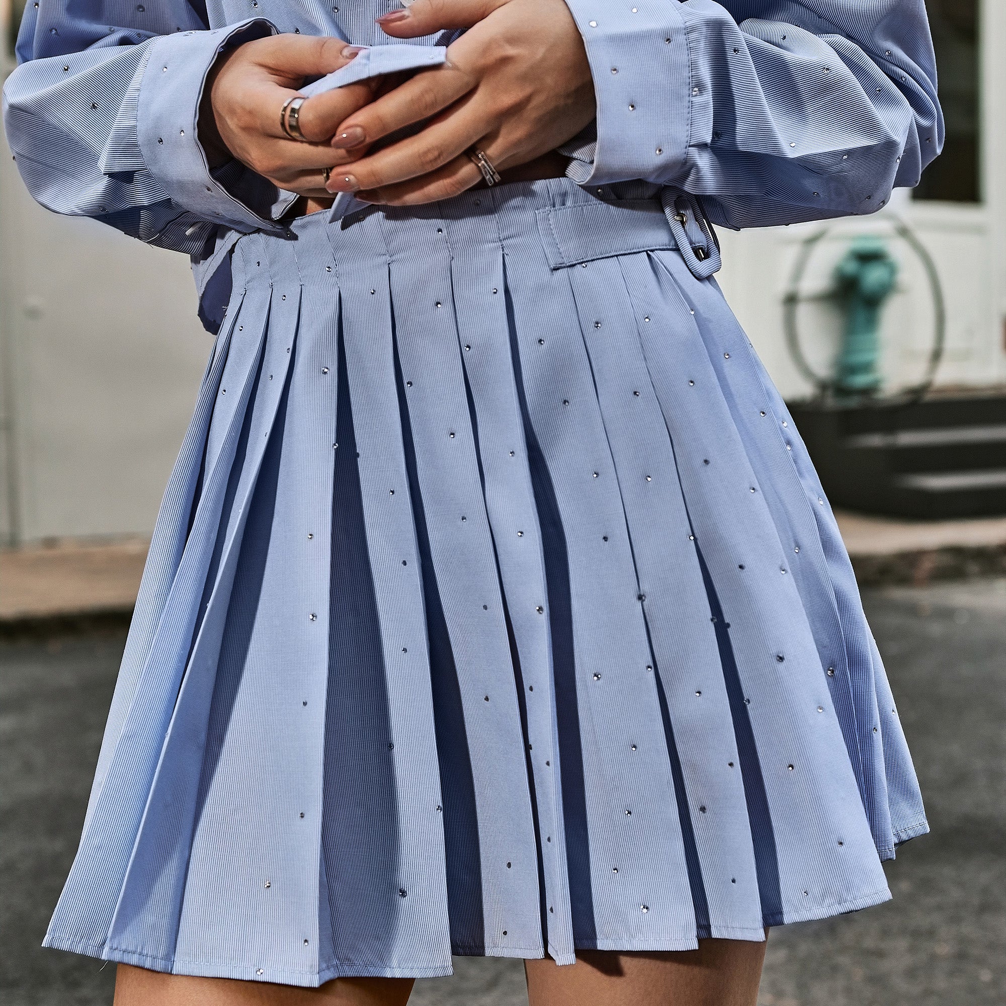 Striped rhinestone-embellished pleated mini skirt