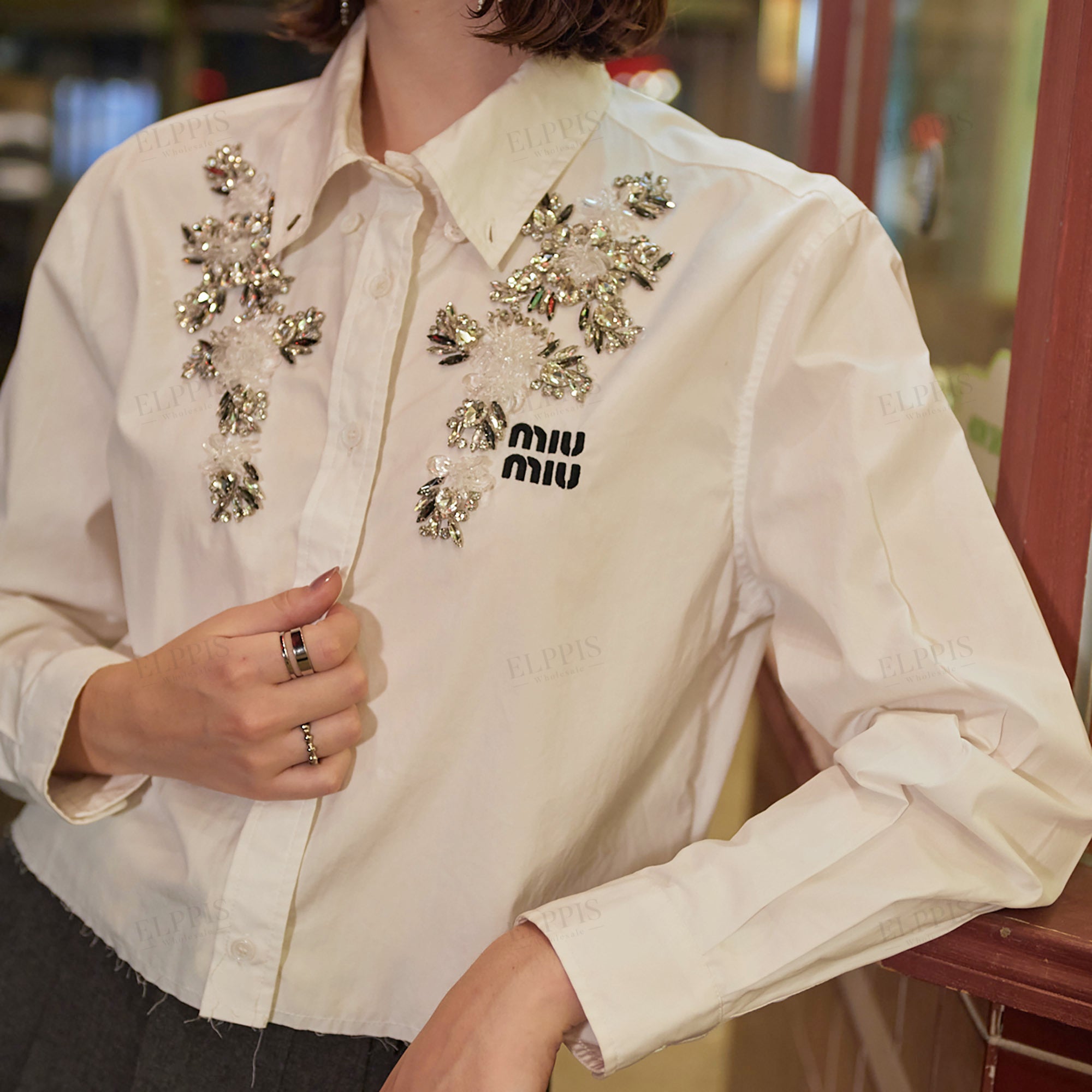 Hand-beaded cropped long sleeve shirt