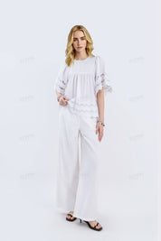 White Short-Sleeve Blouse with Cutwork Embroidery & Ruffled Hem