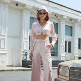 Metal eyelet studded cropped jacket
