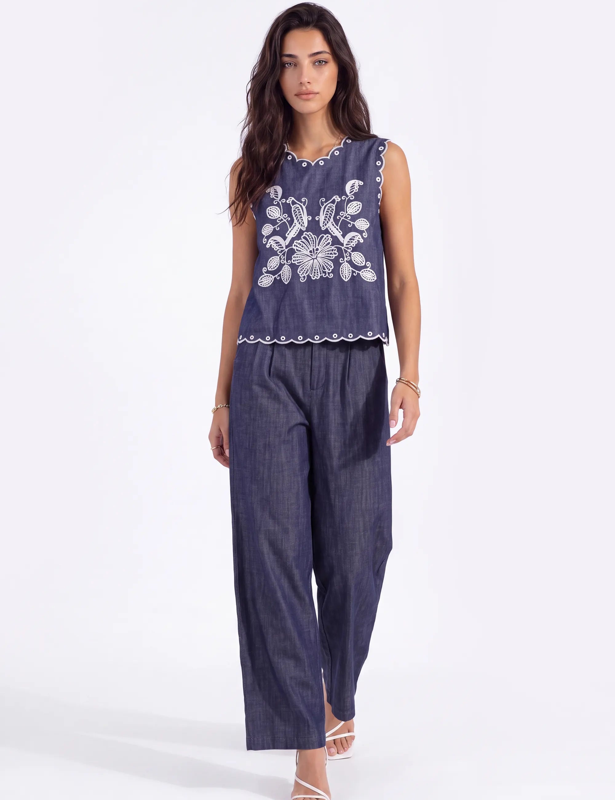 Navy Sleeveless Blouse with Black Lace Embroidery and Shoulder Detail on model, front view – Elppis 1B5D06989WW