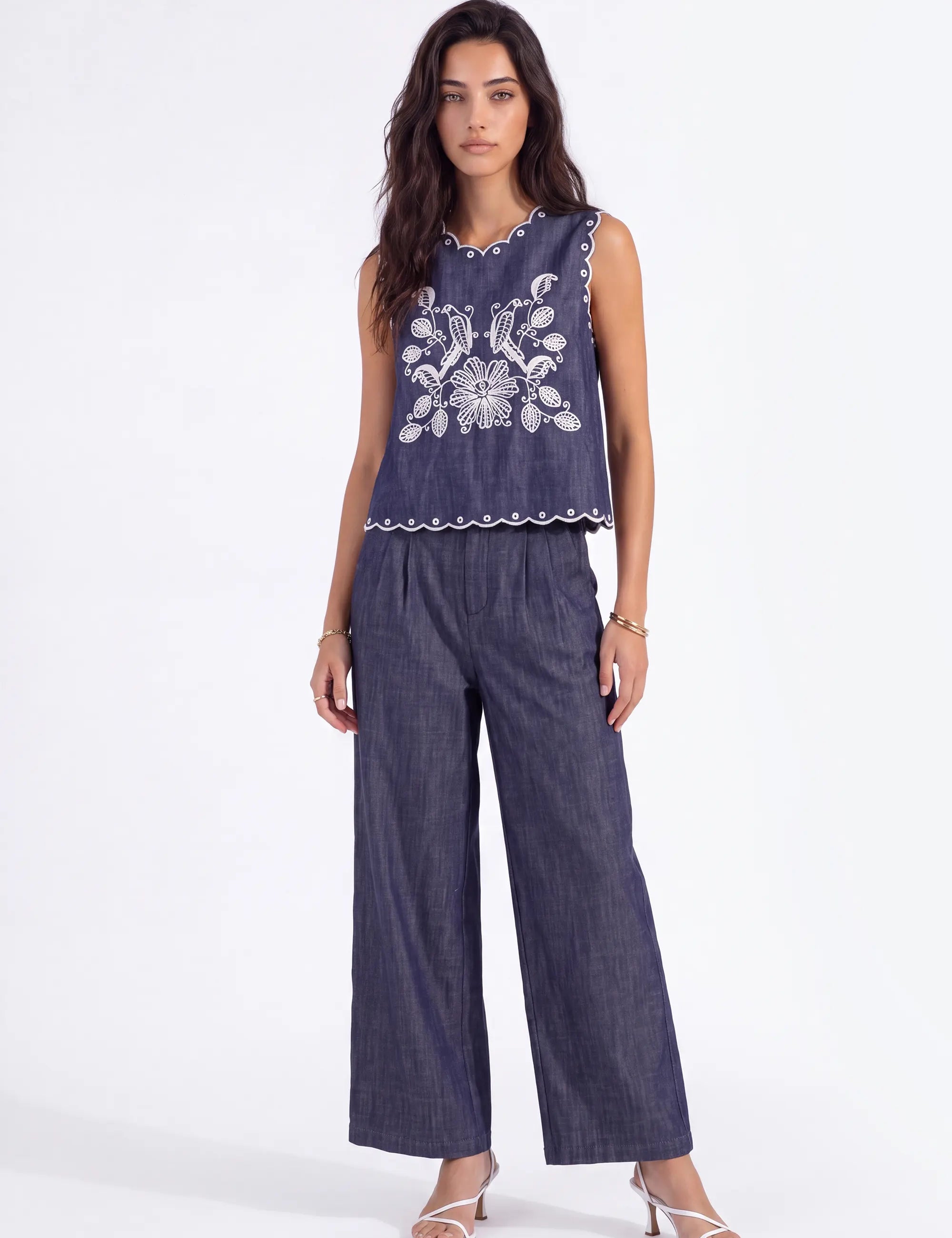 Navy Sleeveless Blouse with Black Lace Embroidery and Shoulder Detail on model, studio view 2 – Elppis 1B5D06989WW
