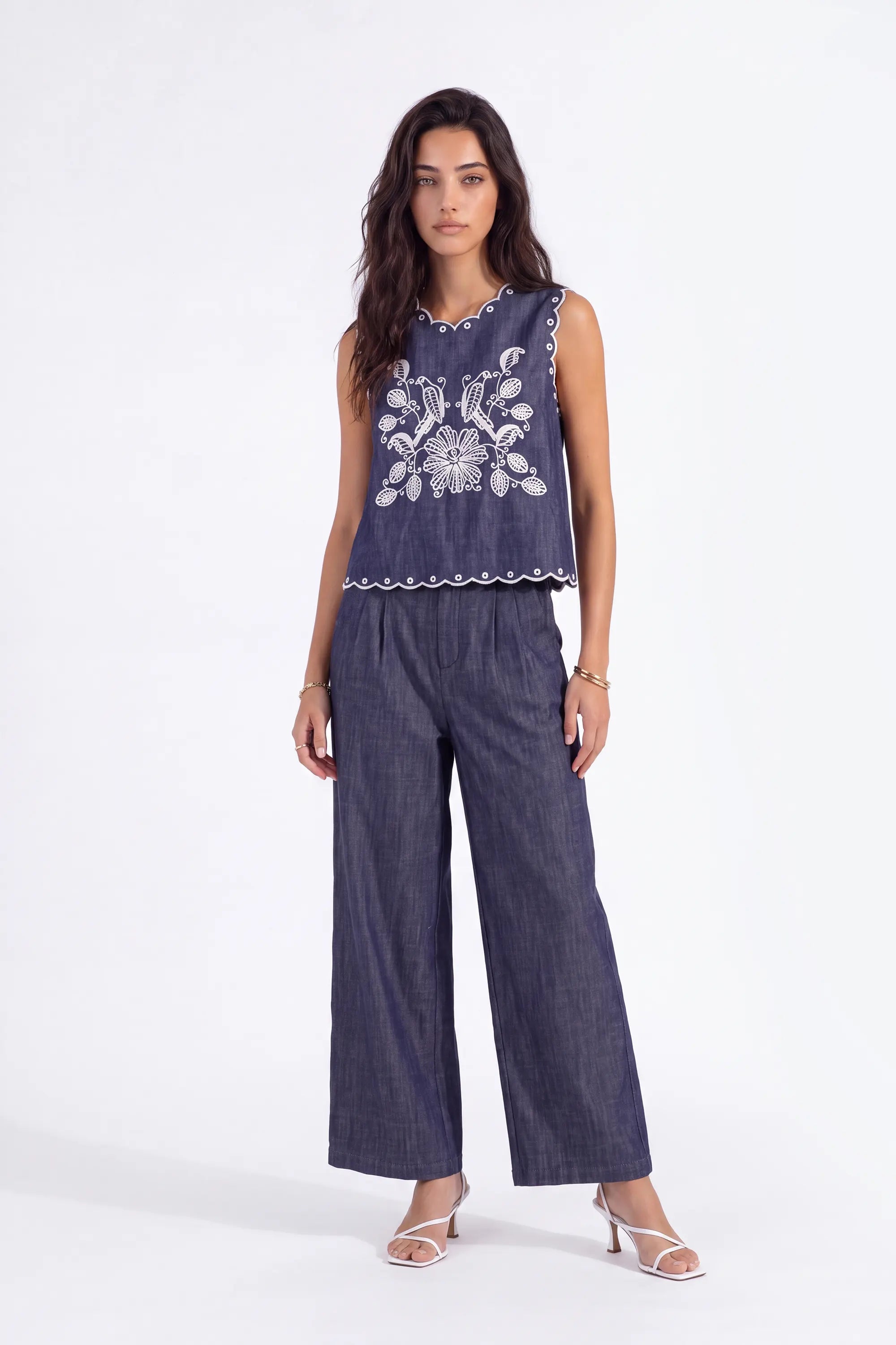 Navy Sleeveless Blouse with Black Lace Embroidery and Shoulder Detail on model, studio view 2 – Elppis 1B5D06989WW