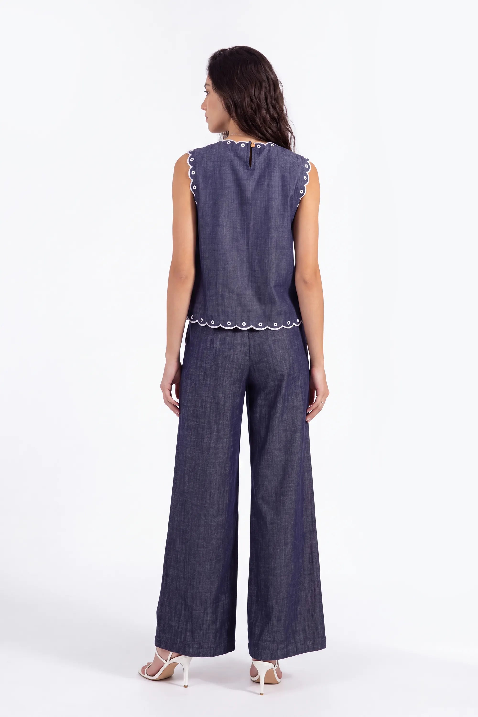 Navy Sleeveless Blouse with Black Lace Embroidery and Shoulder Detail on model, studio view 3 – Elppis 1B5D06989WW