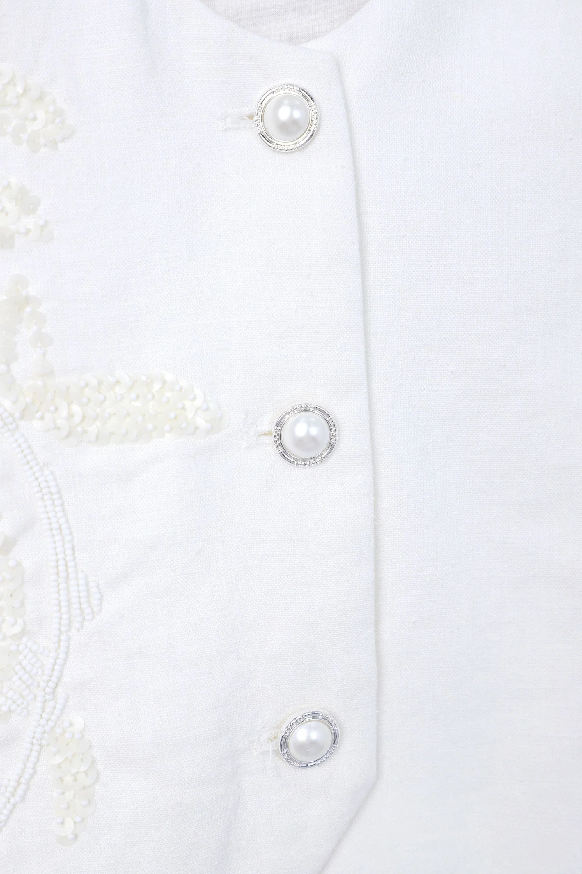 White Cropped Vest with Floral Cutwork Embroidery and Pearl Buttons product detail 1 – Elppis 1B5D07501WW-01CM
