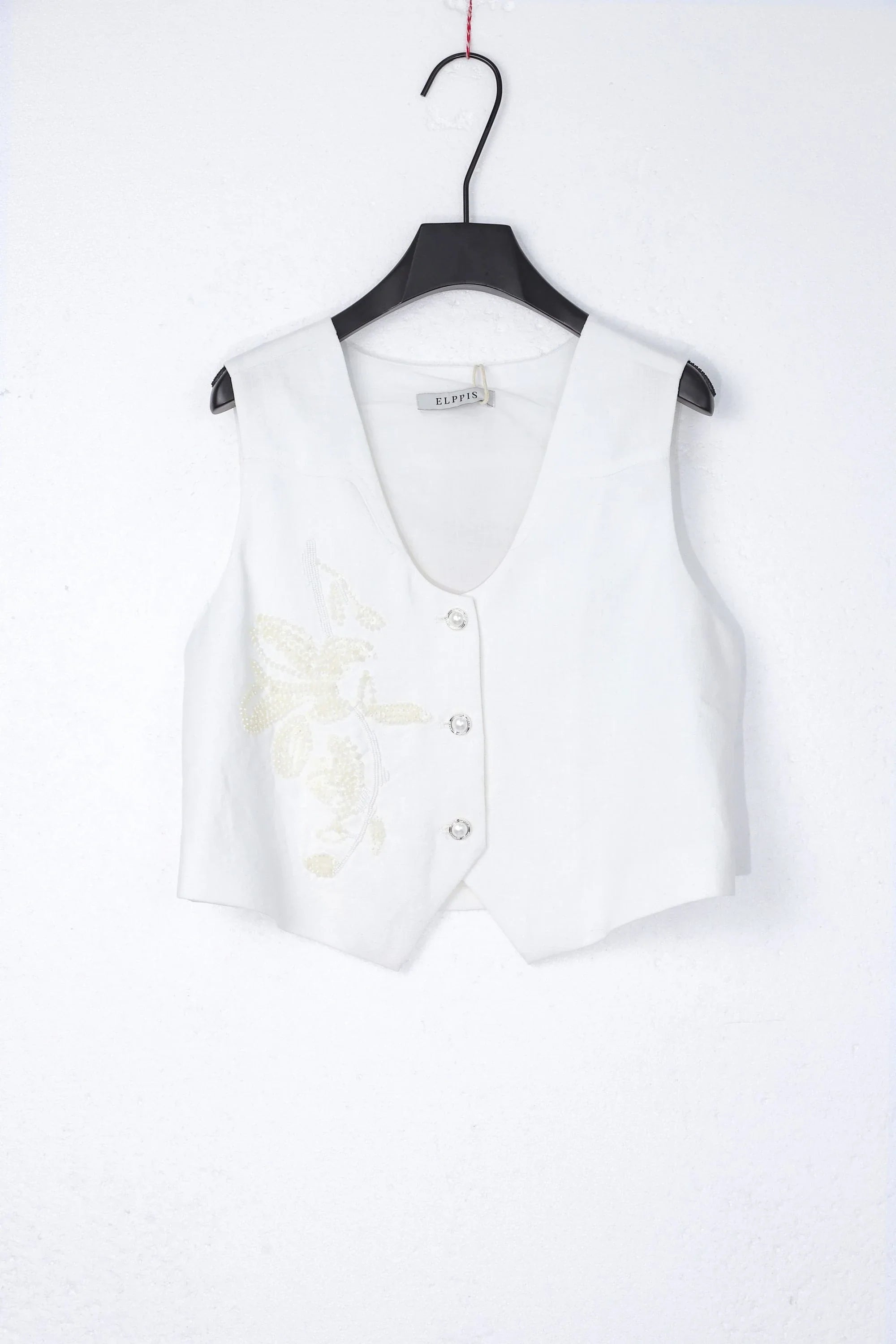 White Cropped Vest with Floral Cutwork Embroidery and Pearl Buttons product view – Elppis 1B5D07501WW-01CM