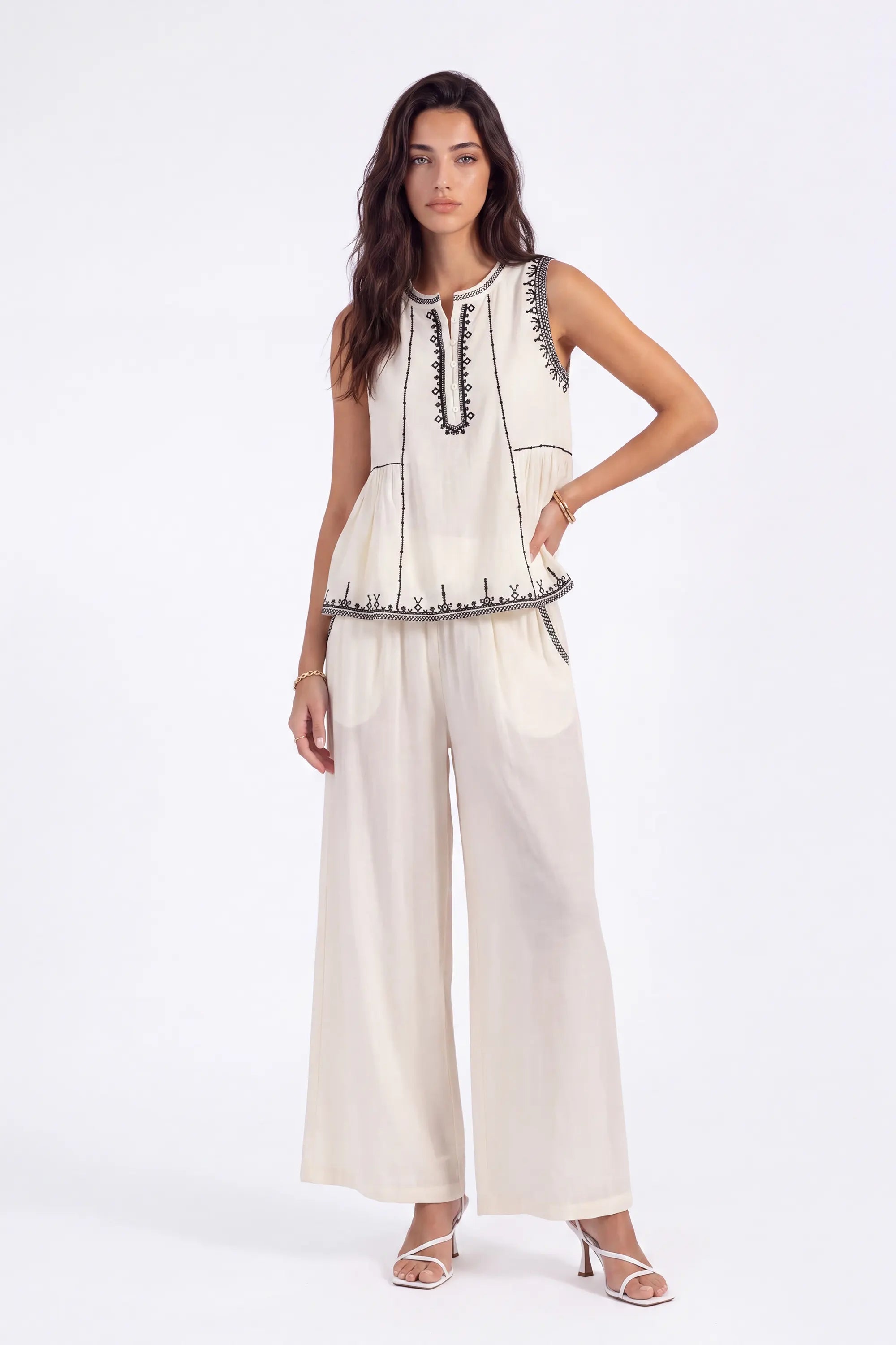 Cream Sleeveless Top with Black Embroidered Trim on model, studio view 3 – Elppis 1B5E08923WW