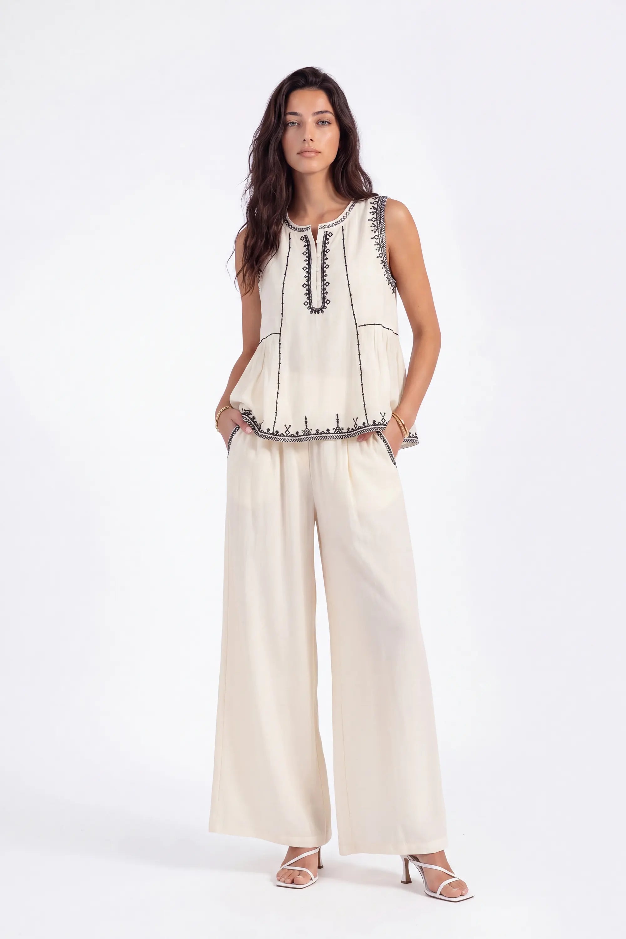 Cream Sleeveless Top with Black Embroidered Trim on model, studio view 4 – Elppis 1B5E08923WW