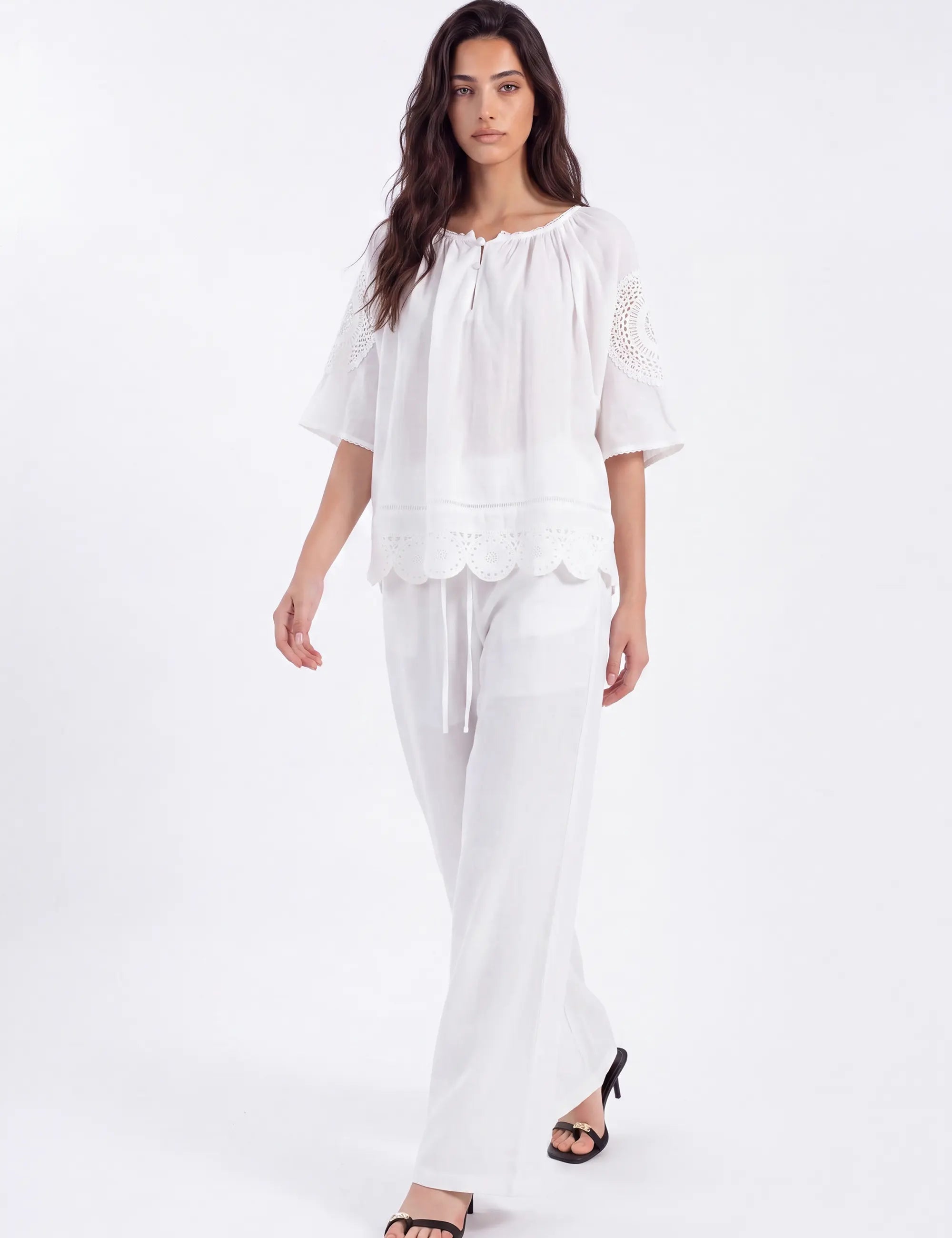 White Blouse with Crochet Lace Accents and Bell Sleeves on model, front view – Elppis 1B5E09168WW-01CM