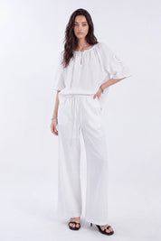White Blouse with Crochet Lace Accents and Bell Sleeves on model, studio view 3 – Elppis 1B5E09168WW-01CM