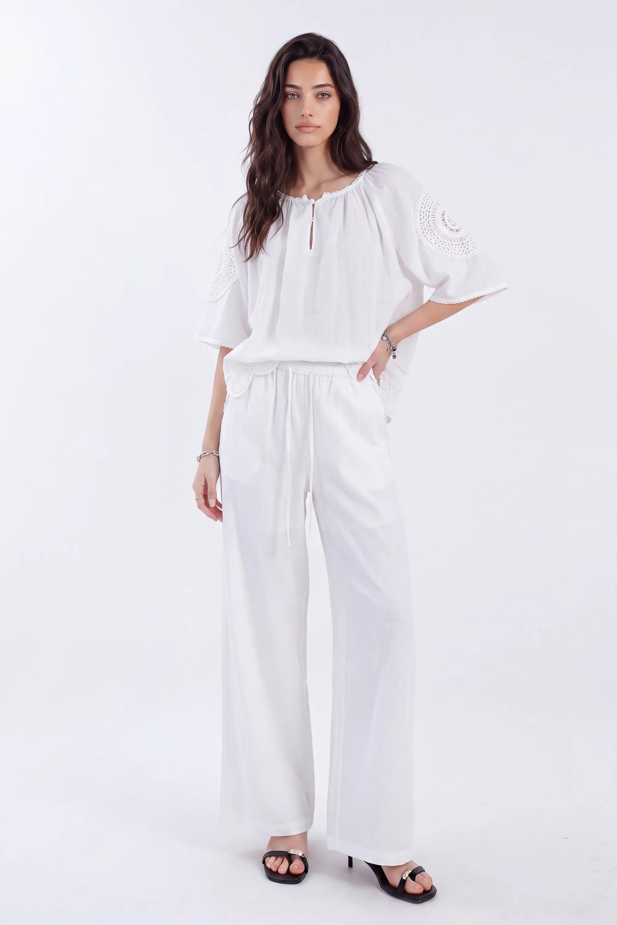 White Blouse with Crochet Lace Accents and Bell Sleeves on model, studio view 3 – Elppis 1B5E09168WW-01CM