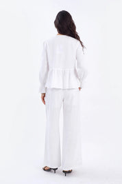 White Woven Blouse with Sequin Embroidery and Peplum Hem on model, back view – Elppis 1B5F09175WW-01CM