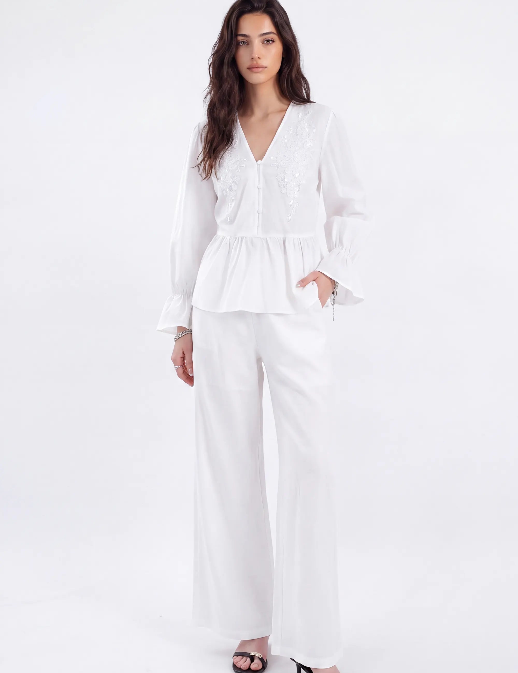 White Woven Blouse with Sequin Embroidery and Peplum Hem on model, studio view 2 – Elppis 1B5F09175WW-01CM