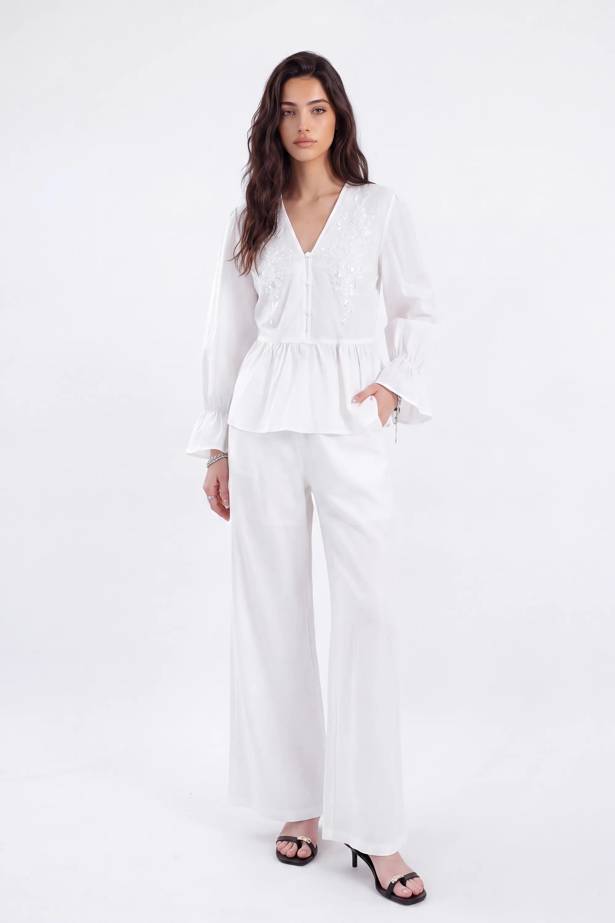 White Woven Blouse with Sequin Embroidery and Peplum Hem on model, studio view 2 – Elppis 1B5F09175WW-01CM