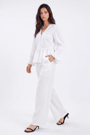 White Woven Blouse with Sequin Embroidery and Peplum Hem on model, studio view 3 – Elppis 1B5F09175WW-01CM