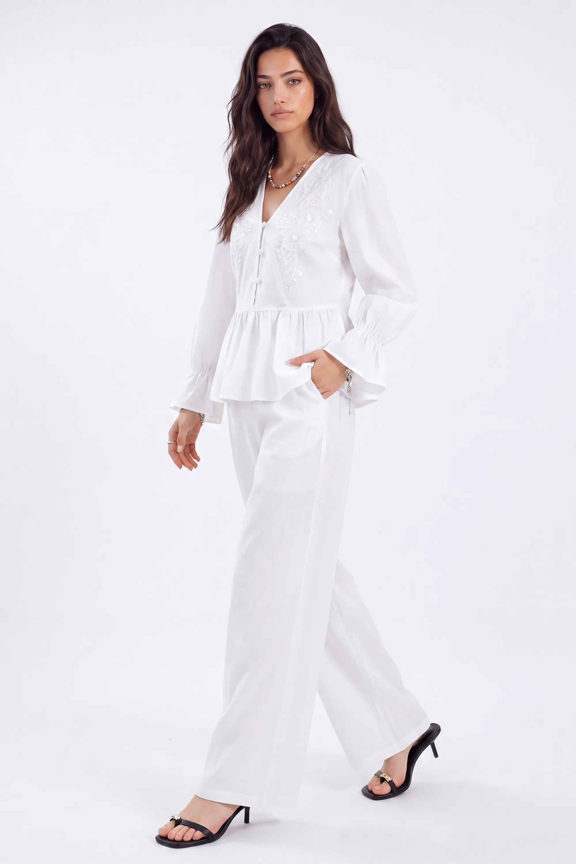 White Woven Blouse with Sequin Embroidery and Peplum Hem on model, studio view 3 – Elppis 1B5F09175WW-01CM