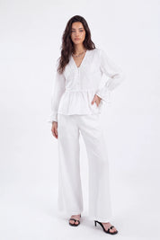 White Woven Blouse with Sequin Embroidery and Peplum Hem on model, studio view 4 – Elppis 1B5F09175WW-01CM