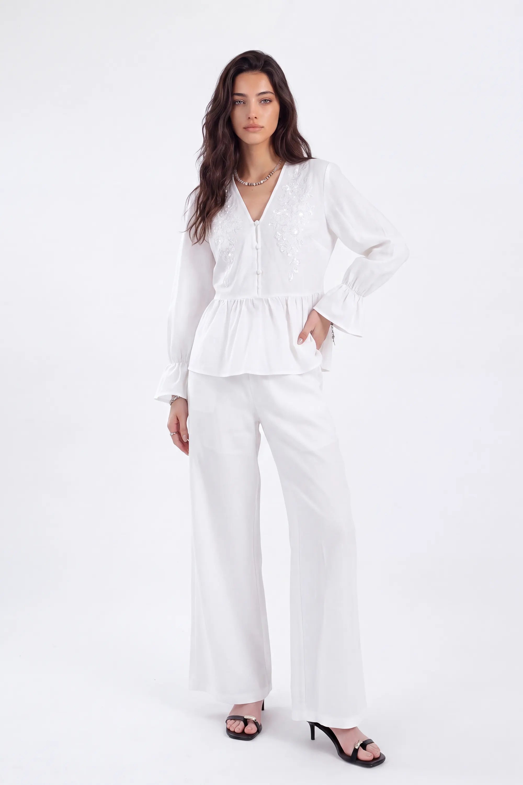 White Woven Blouse with Sequin Embroidery and Peplum Hem on model, studio view 4 – Elppis 1B5F09175WW-01CM