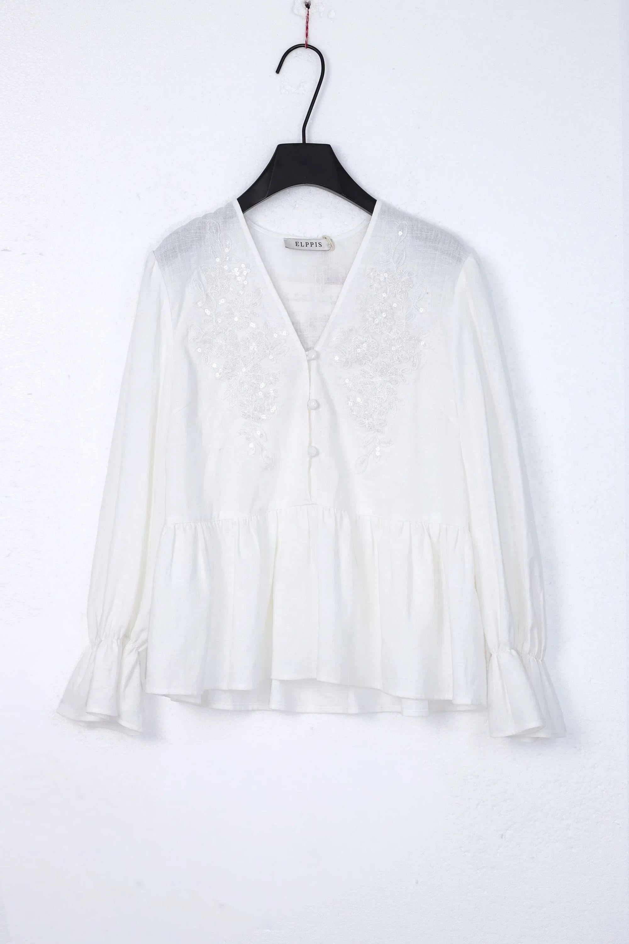 White Woven Blouse with Sequin Embroidery and Peplum Hem product view – Elppis 1B5F09175WW-01CM