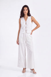 White Wide-Leg Pants with Floral Cutwork Embroidery on model, studio view 7 – Elppis 1B5I07505WW