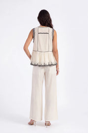 Cream Wide-Leg Pants with Black Embroidered Trim on model, back view – Elppis 1B5I08924WW