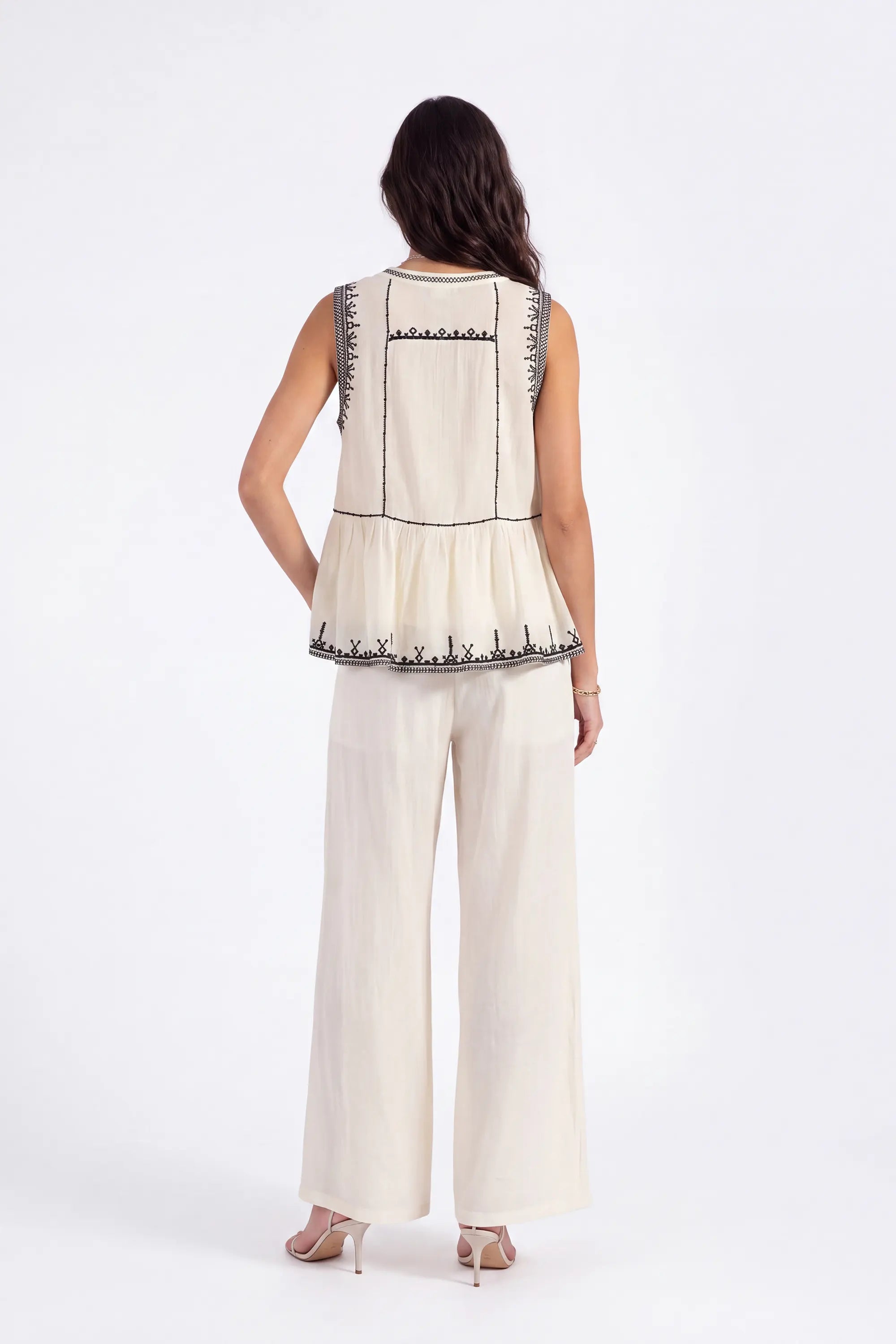 Cream Wide-Leg Pants with Black Embroidered Trim on model, back view – Elppis 1B5I08924WW