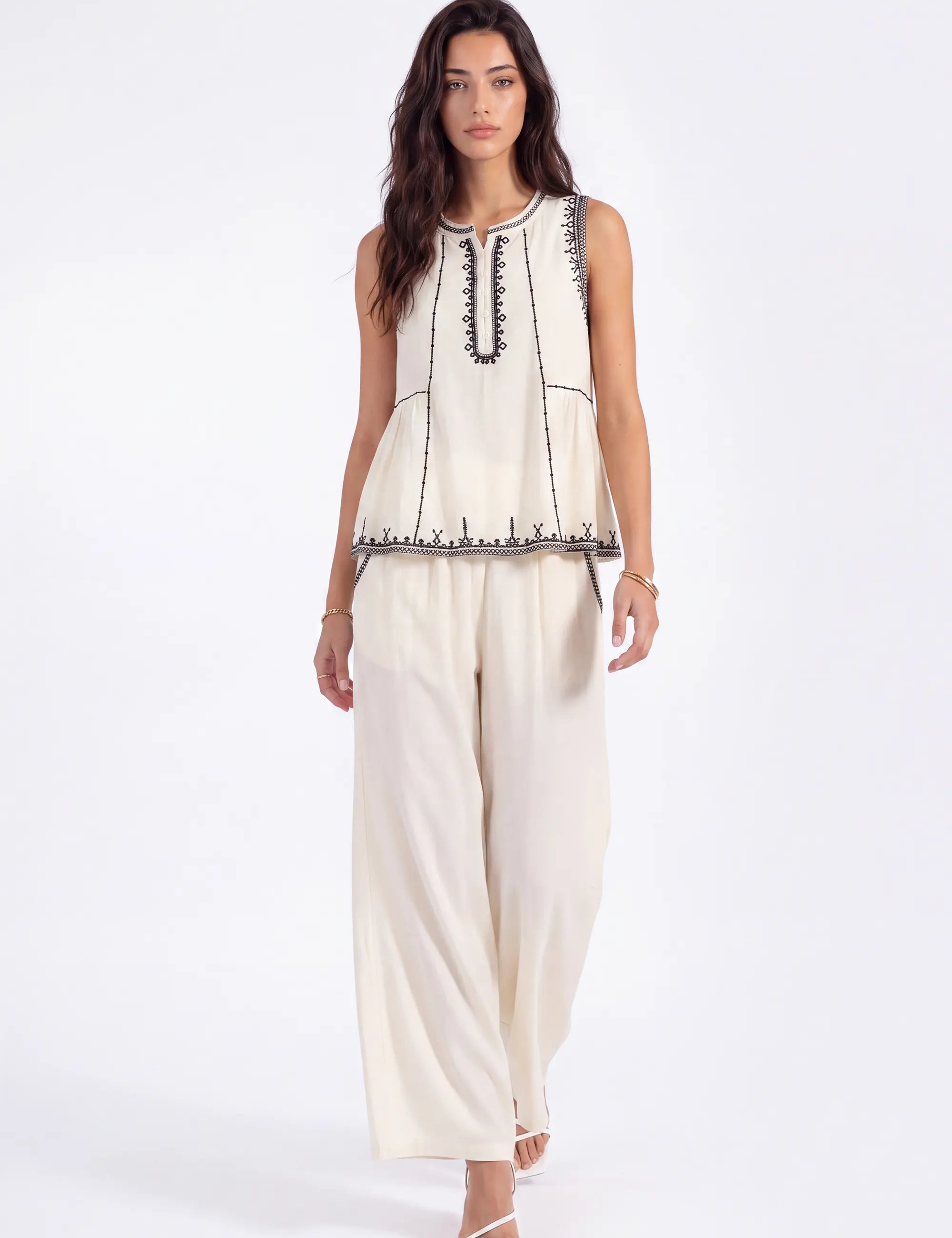 Cream Wide-Leg Pants with Black Embroidered Trim on model, front view – Elppis 1B5I08924WW