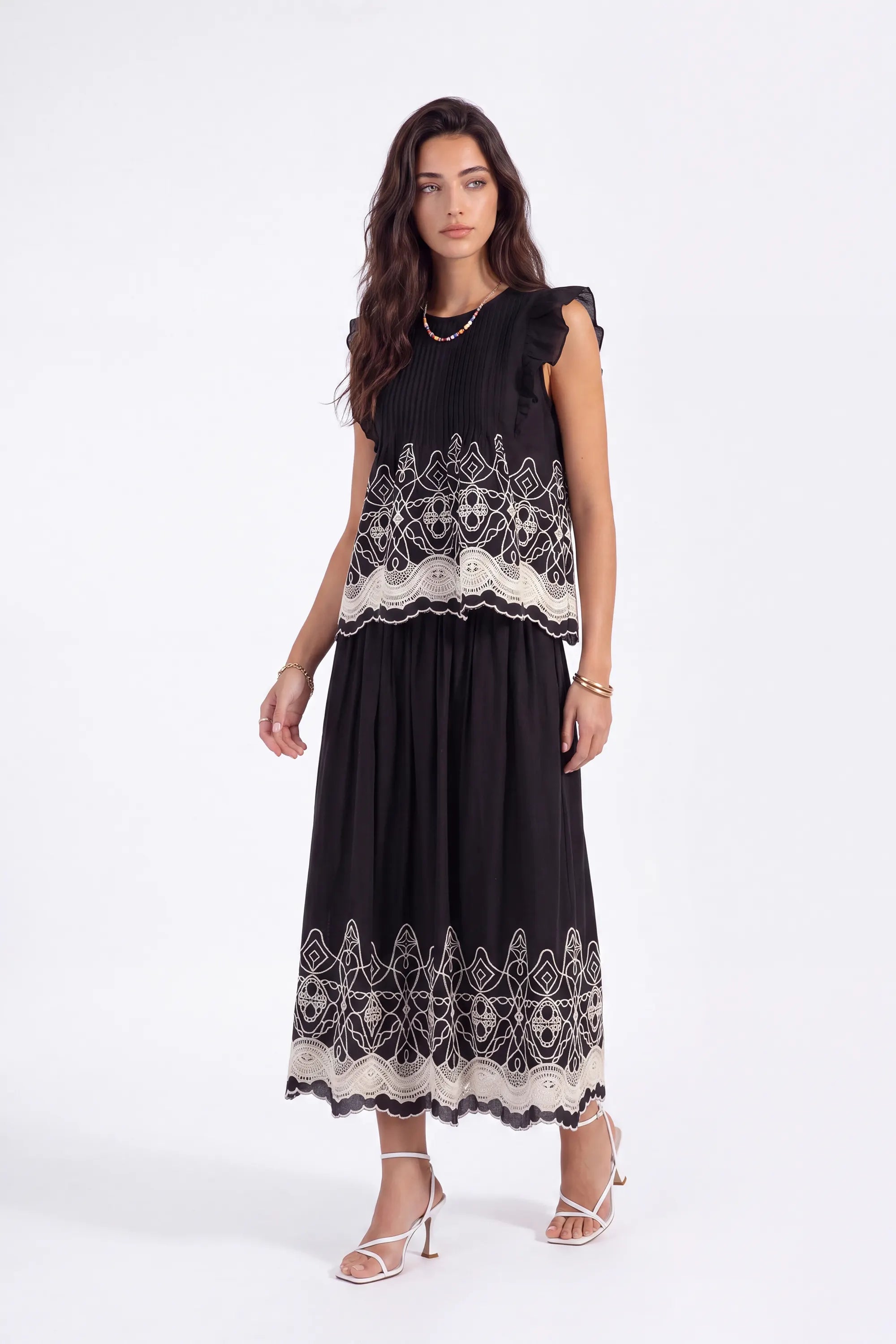 Black Embroidered Midi Skirt with White Lace Hem on model, front view – Elppis 1J5J09674BN