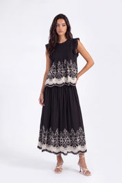 Black Embroidered Midi Skirt with White Lace Hem on model, studio view 2 – Elppis 1J5J09674BN