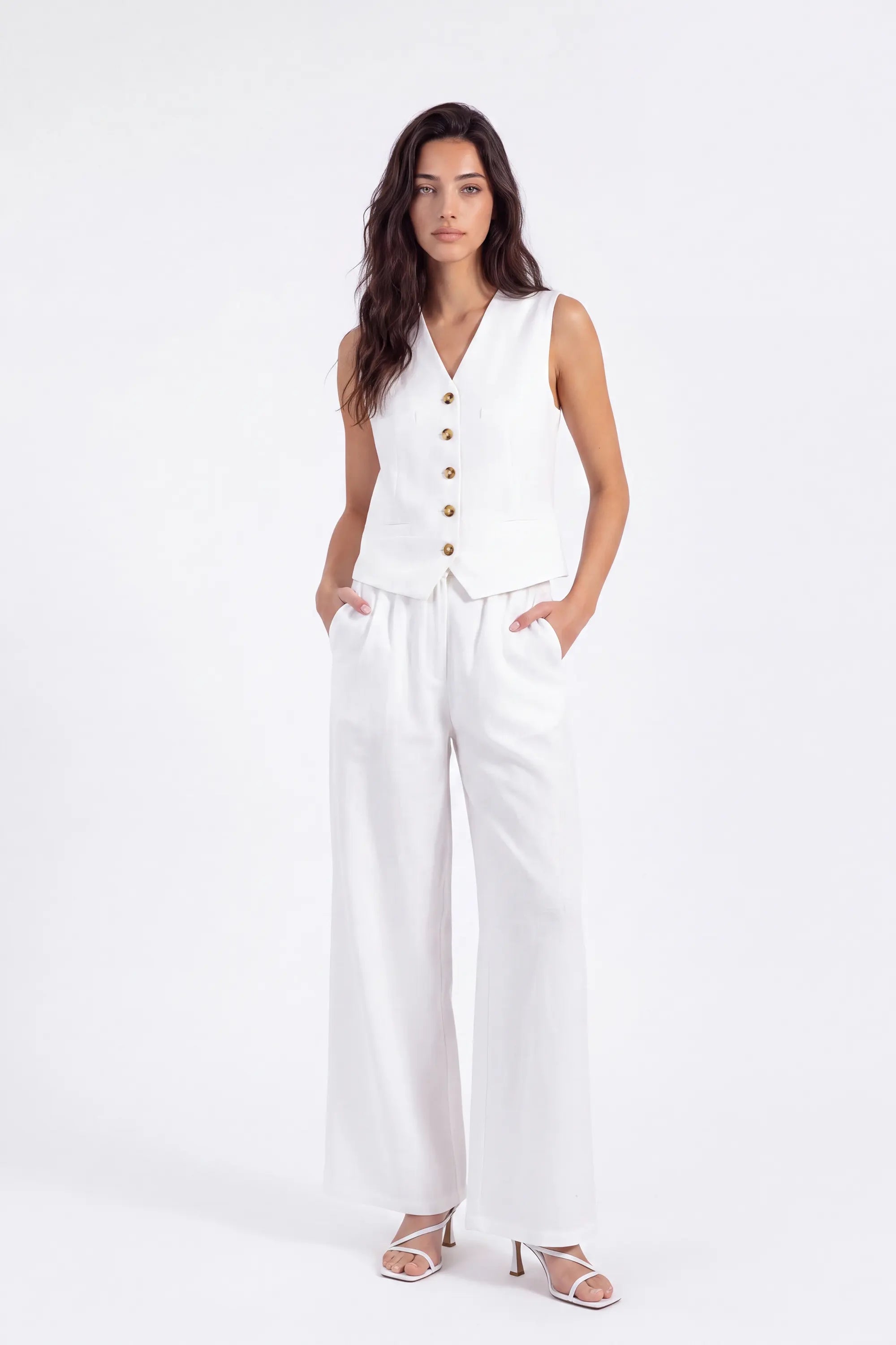 White Tailored Button-Front Sleeveless Vest on model, studio view 3 – Elppis 2B5D05442WW