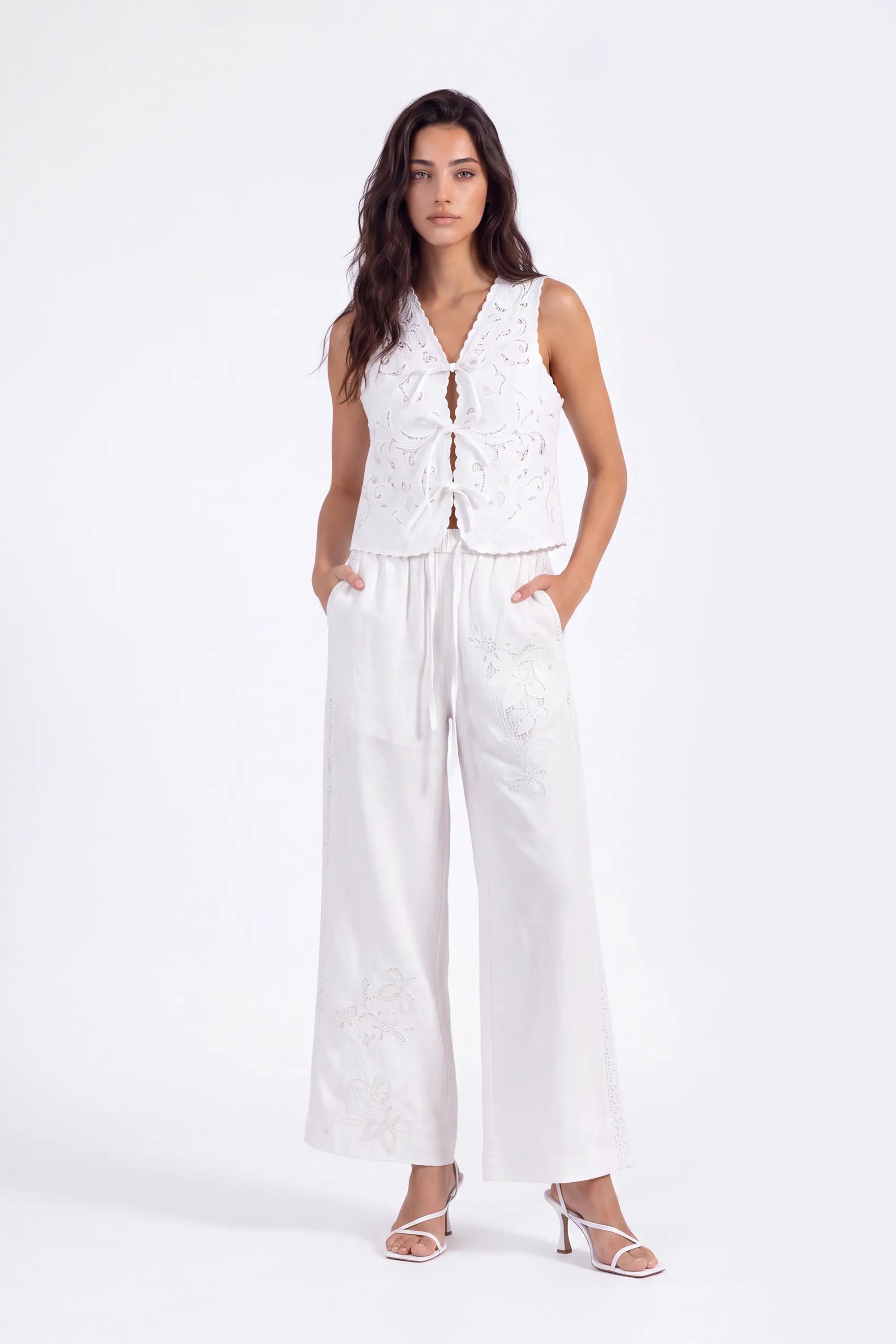 White Floral Lace Cropped Vest with Tie Detail on model, studio view 3 – Elppis 2B5D07666WW