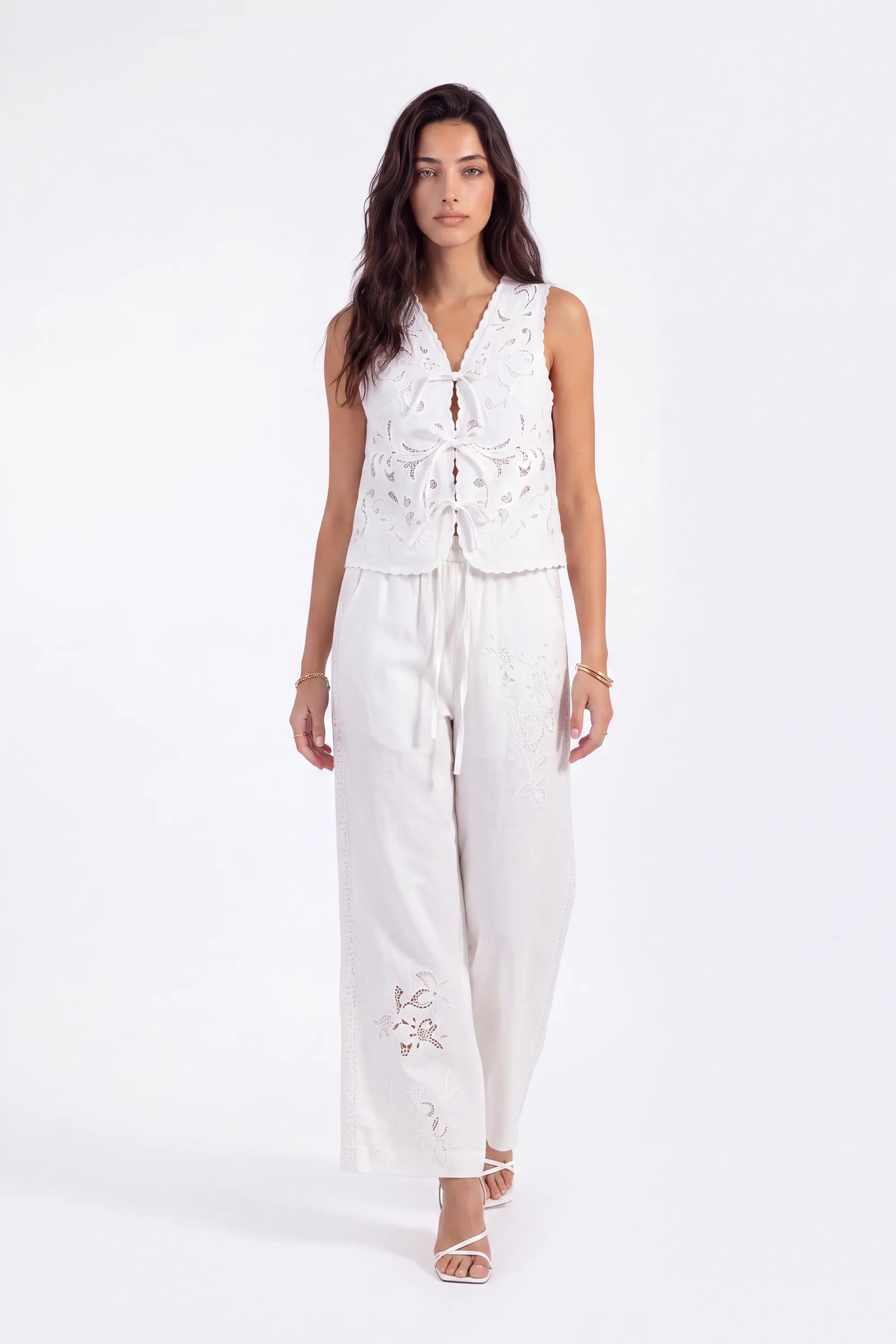White Floral Lace Cropped Vest with Tie Detail on model, studio view 4 – Elppis 2B5D07666WW