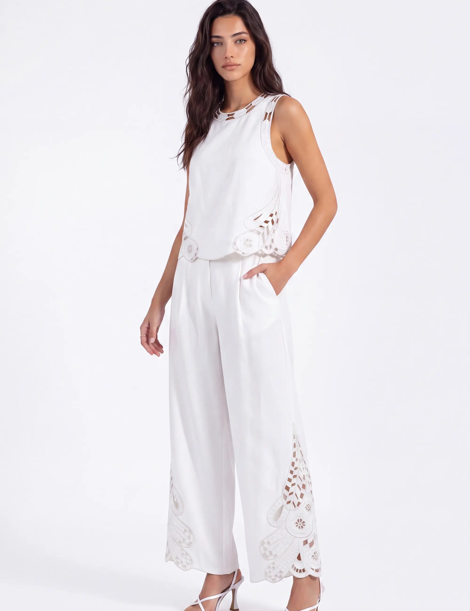 White Sleeveless Top with Cutout Embroidery Detail on model, front view – Elppis 2B5D08021WW