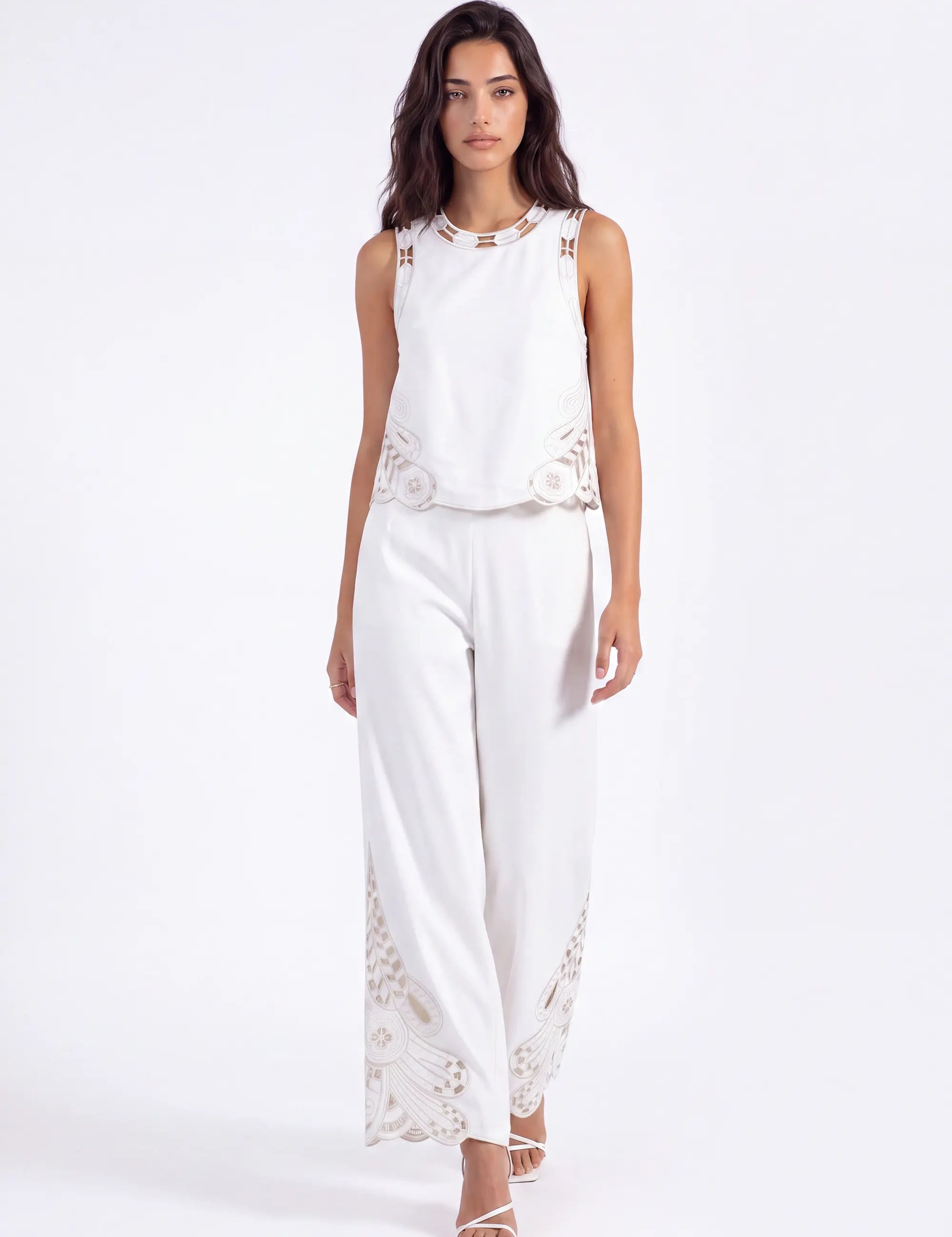 White Sleeveless Top with Cutout Embroidery Detail on model, studio view 2 – Elppis 2B5D08021WW