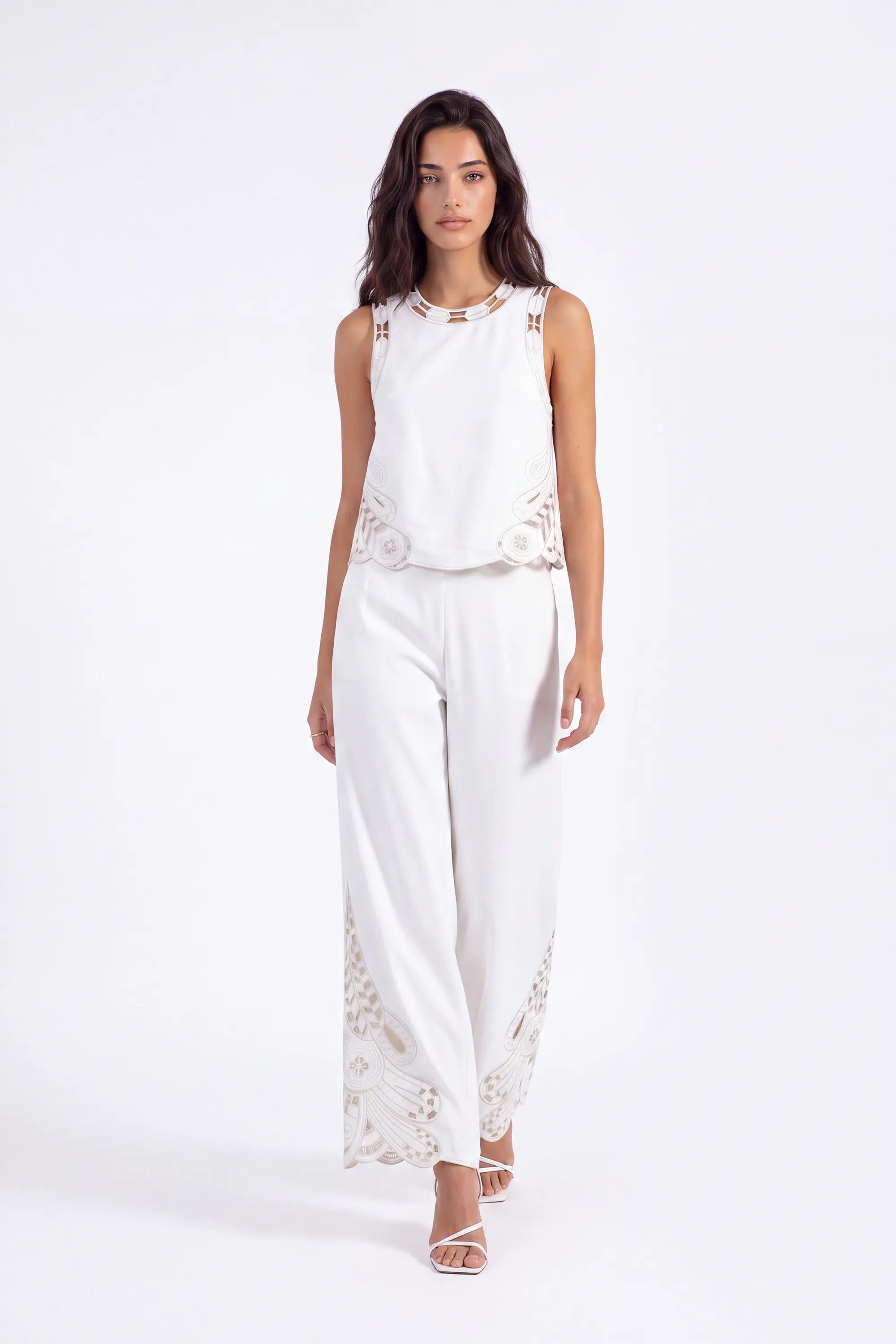 White Sleeveless Top with Cutout Embroidery Detail on model, studio view 2 – Elppis 2B5D08021WW