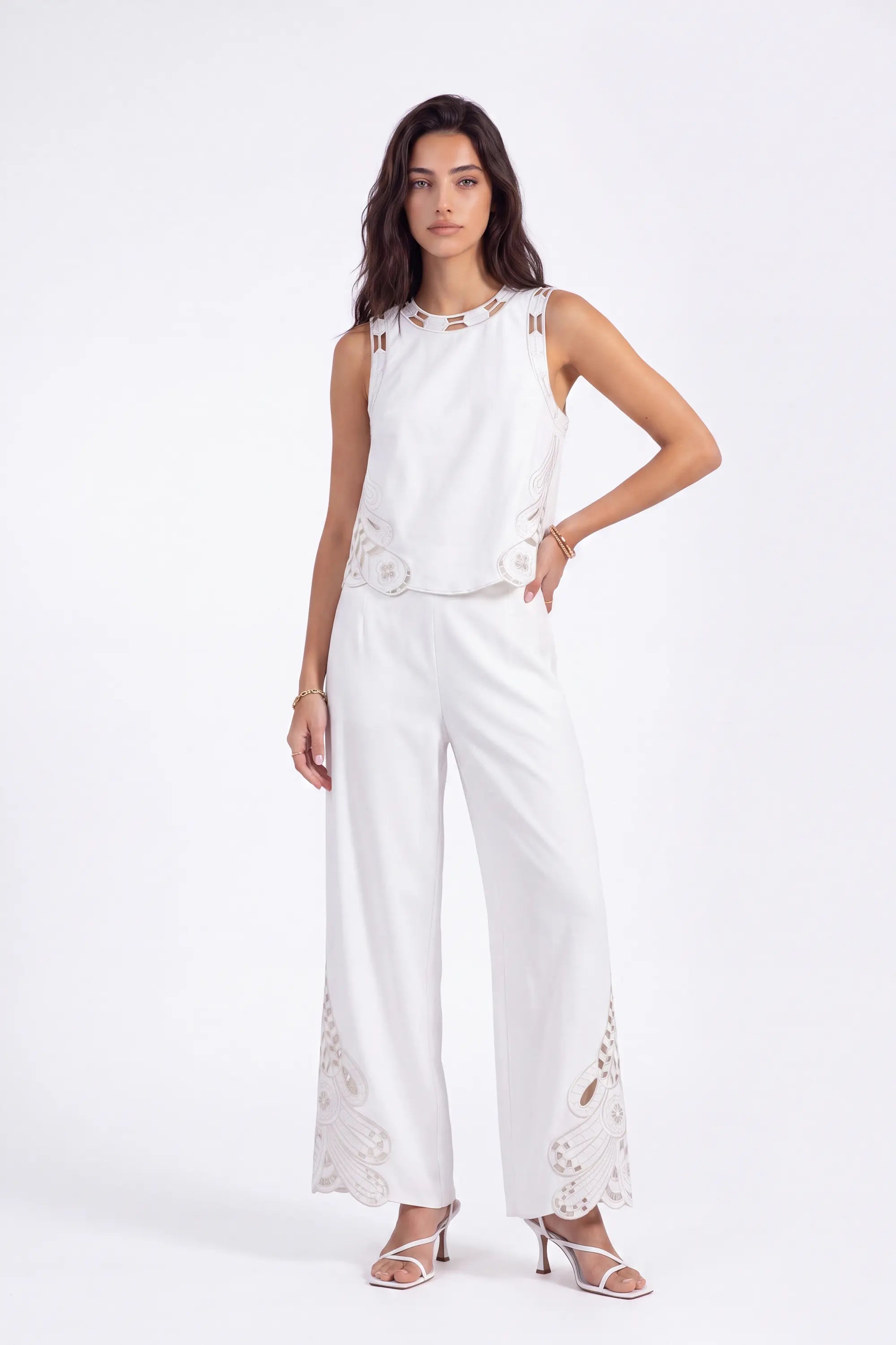 White Sleeveless Top with Cutout Embroidery Detail on model, studio view 3 – Elppis 2B5D08021WW