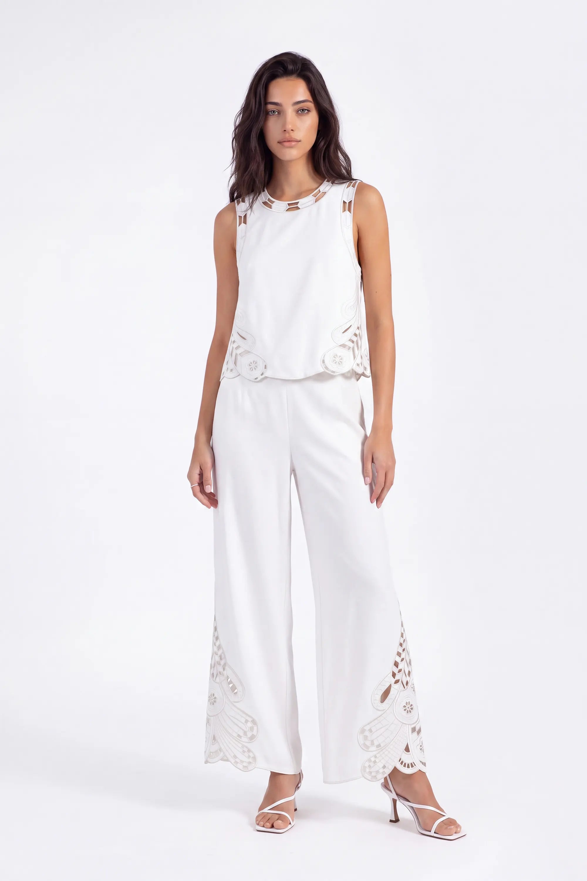 White Sleeveless Top with Cutout Embroidery Detail on model, studio view 4 – Elppis 2B5D08021WW