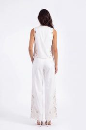White Sleeveless Top with Cutout Embroidery Detail on model, studio view 5 – Elppis 2B5D08021WW