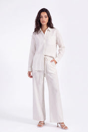 Cream Yarn-Dyed Striped Linen Wide-Leg Pants on model, studio view 3 – Elppis 2B5I05909WW
