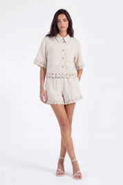 Beige Palm Tree Embroidered Short-Sleeve Shirt with Loop Trim on model, front view – Elppis 2J5E01498JJ-01JJ